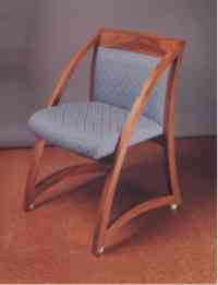 The Diner Wave Chair. Teak with Bronze feet.