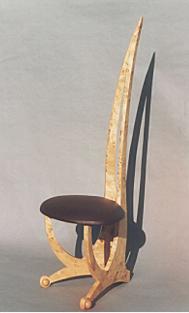 'Spinal' chair. Burr Poplar and Leather
