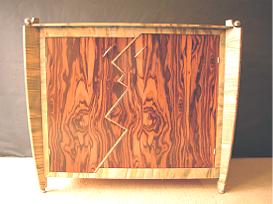 The Kiss in English Sycamore, Macassar Ebony & Stainless Steel Balls.